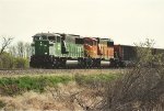 Paused empty coal train waits for a meet